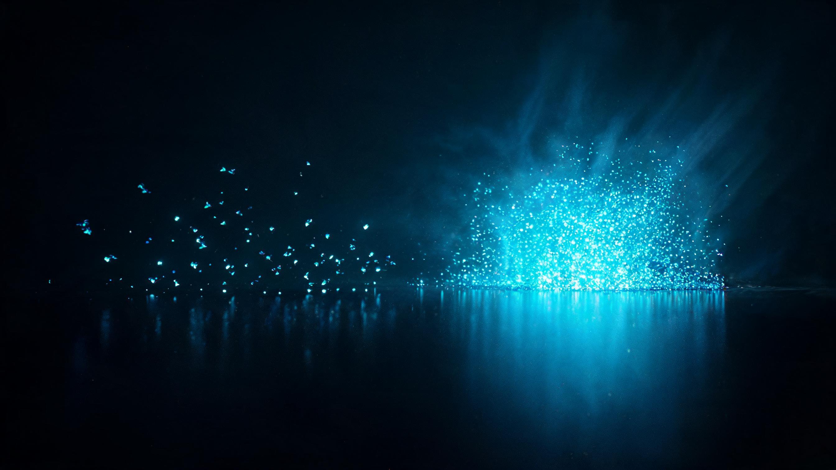 On a dark surface, briefly touching particles scatter while continuously engaging ones merge into a dense luminous cluster, symbolizing genuine community participation rather than one-off posting